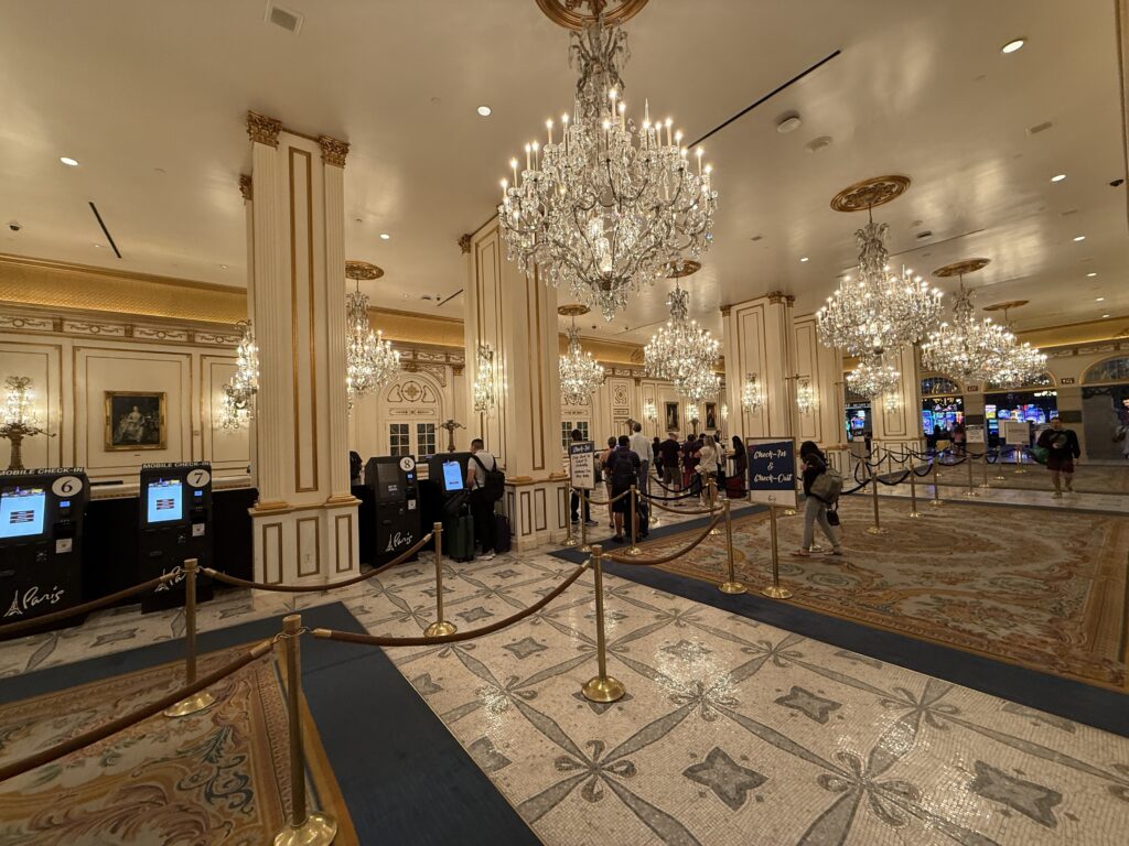 The hotel lobby at Paris, which has decorative chandeliers and European decor. 