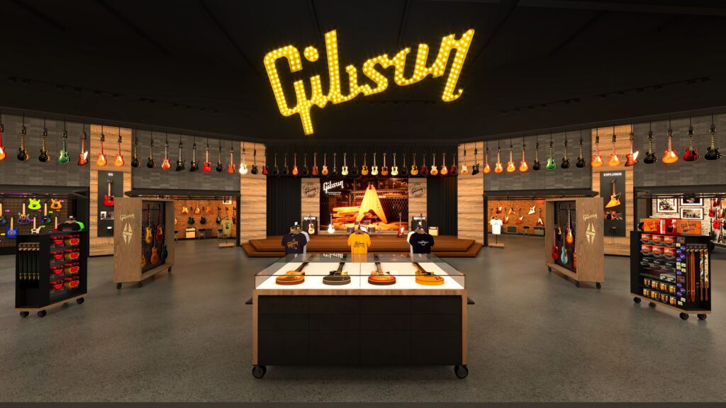 A rendering of a guitar store, with the words Gibson illuminated on the ceiling. 