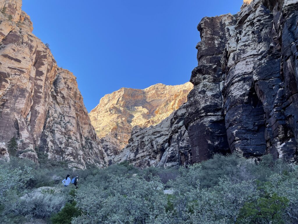 sun drenched peak in between the canyon walls