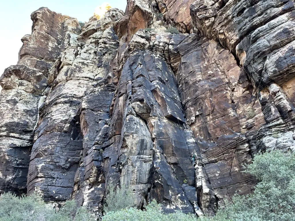 climbers on a cliff face