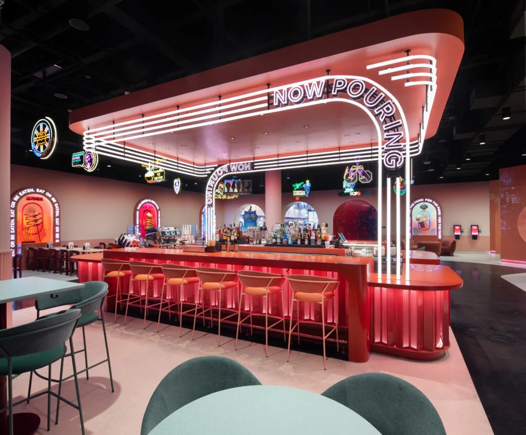 A diner counter accentuated with neon.