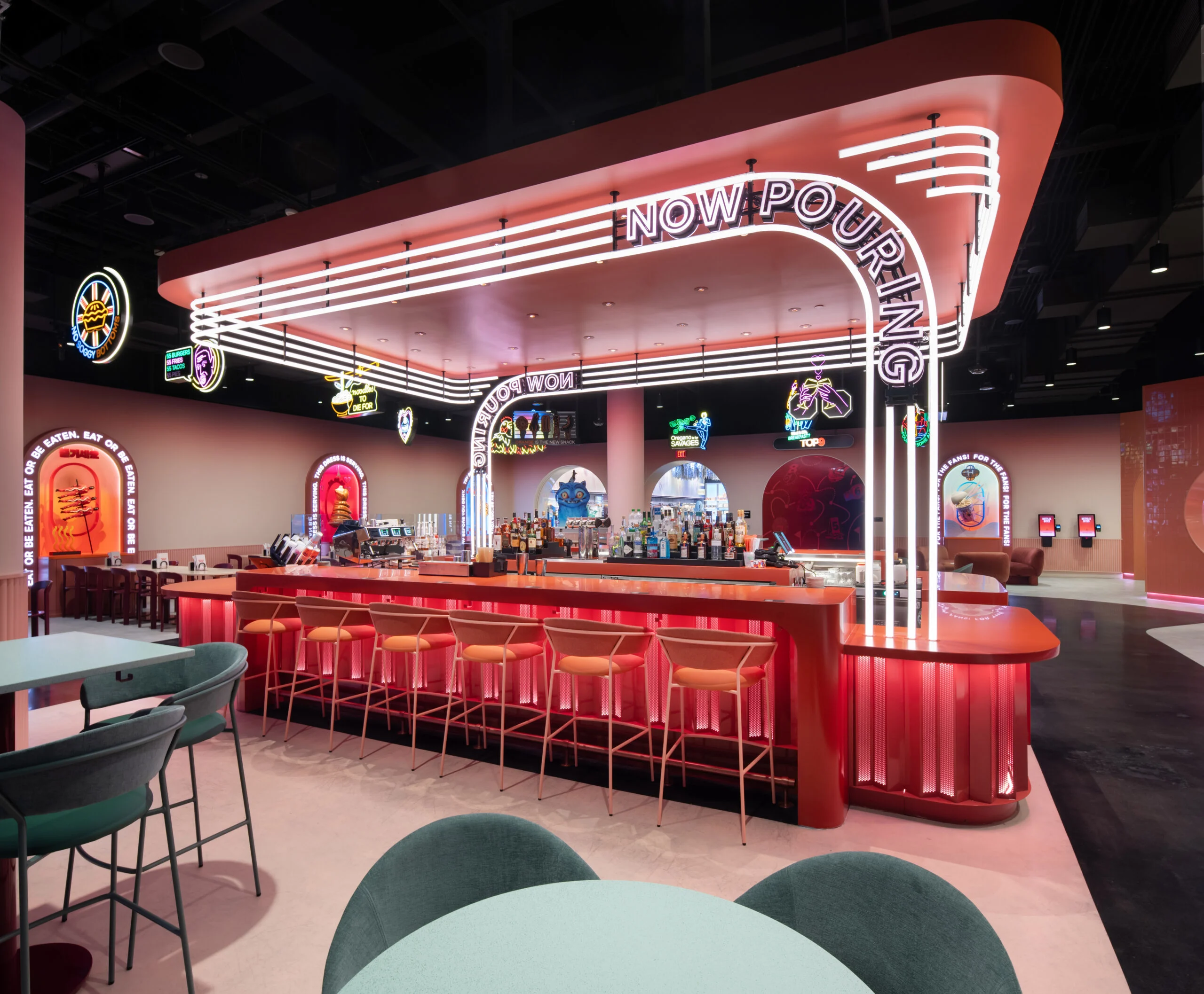 A diner counter accentuated with neon.