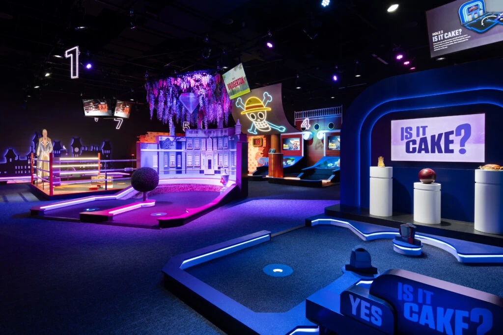 A scene from the show is it cake. 