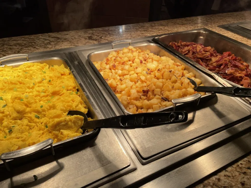 Scrambled eggs, bacon, and breakfast potatoes