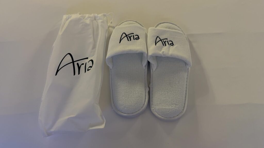 Slippers with "Aria" written on them. 