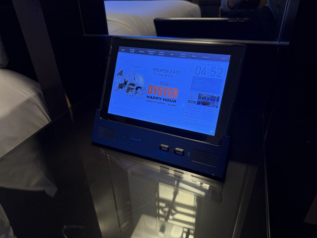 A bedside tablet sitting on an end table. 