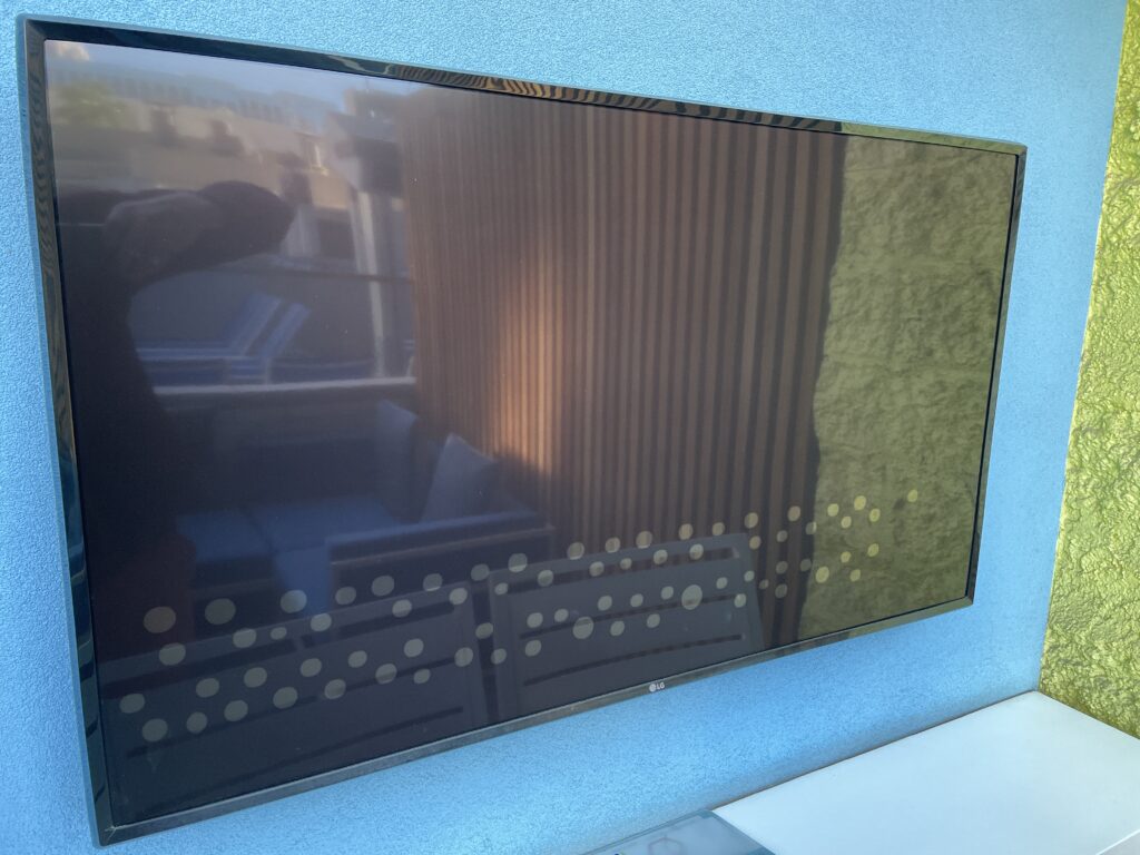 TV with visible dots while turned off