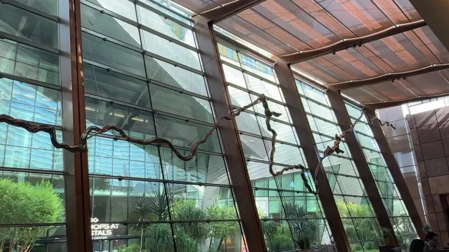 A silver mold of the Colroado River hangs above the hotel registration desk. 