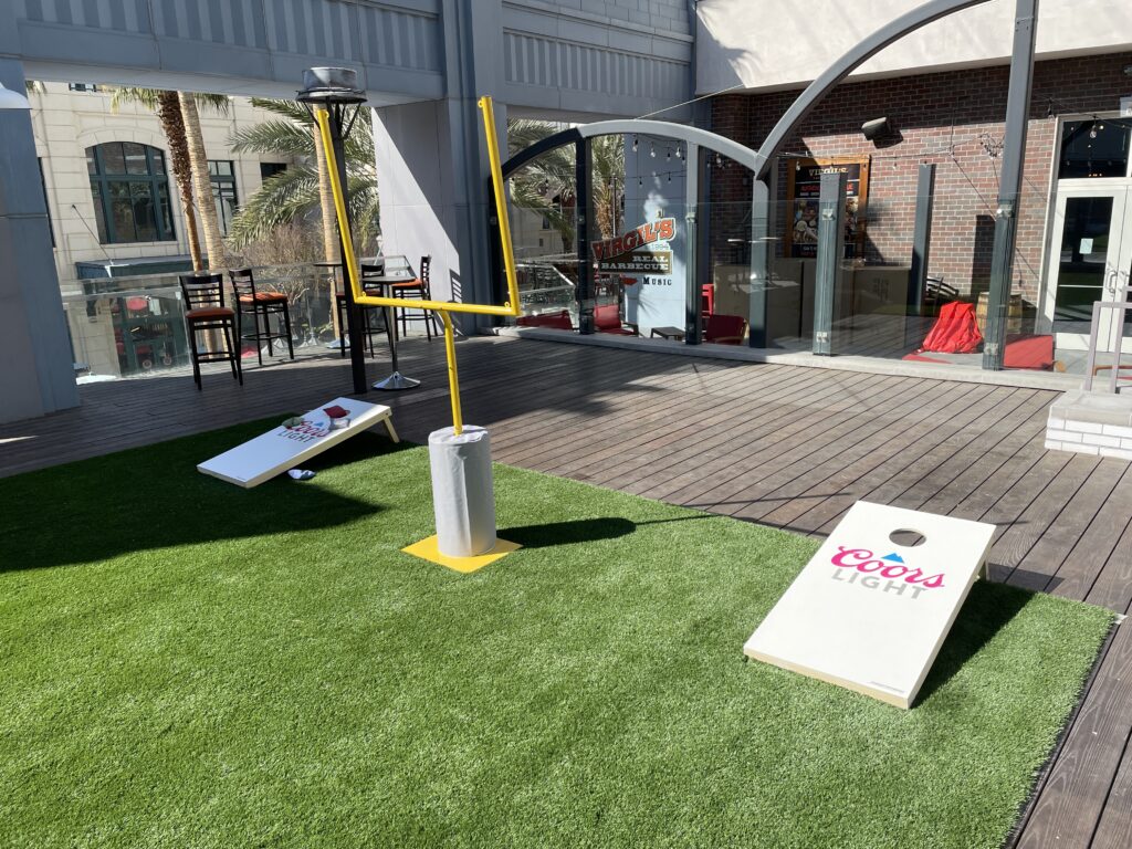 Cornhole boards at Linq's pool