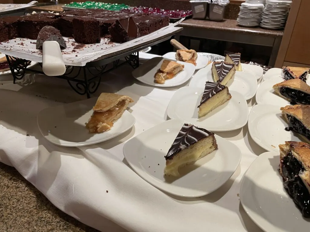 Slices of cake on a dessert table