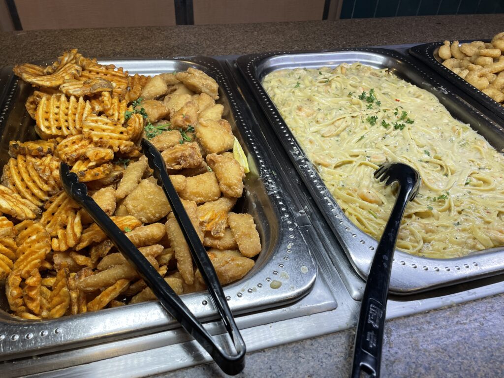 Fried Fish, WAffle Fries, and Shimp pasta at the buffet