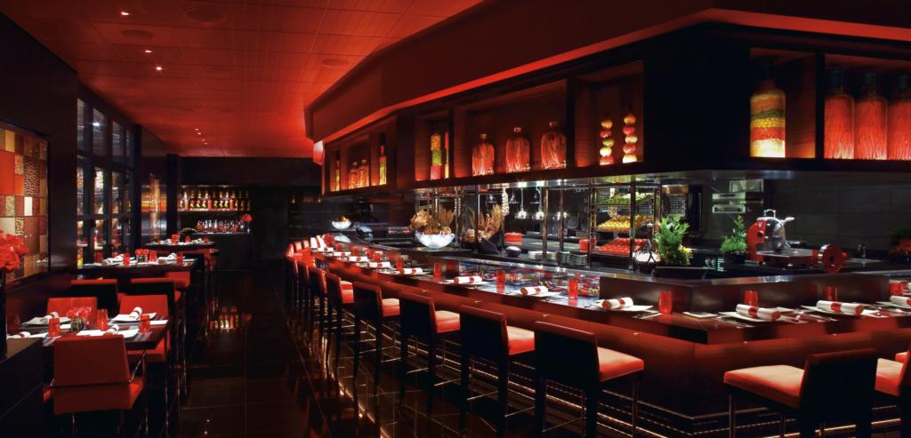 Bar at Latelier illuminated in red