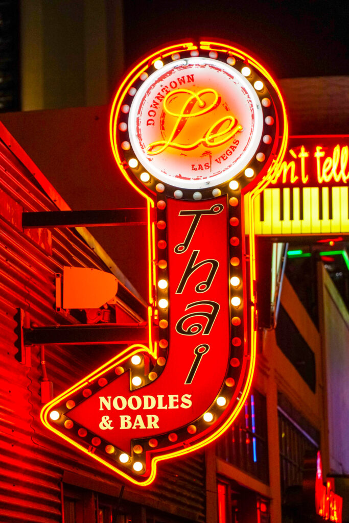 Le Thai sign illuminated at night