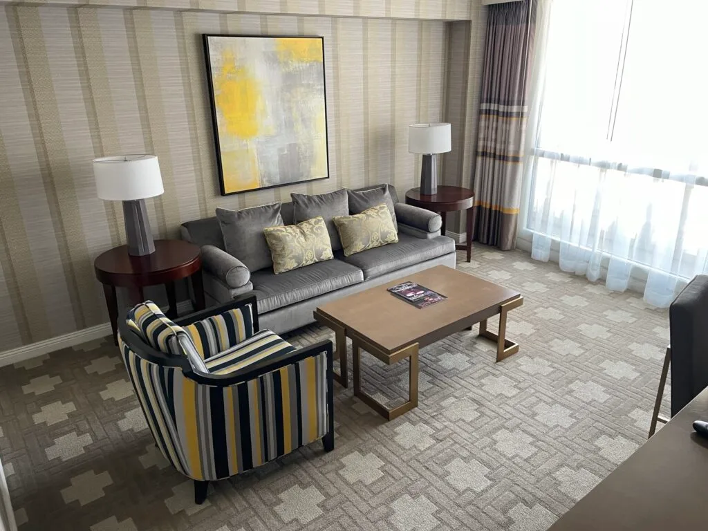 Living area complete with a couch and chair