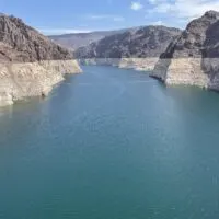 Lake Mead behind the Hoover Dam with a white bathtub ring visible on the canyon walls