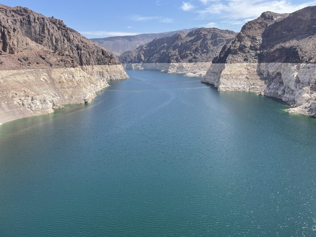 Lake Mead behind the Hoover Dam with a white bathtub ring visible on the canyon walls
