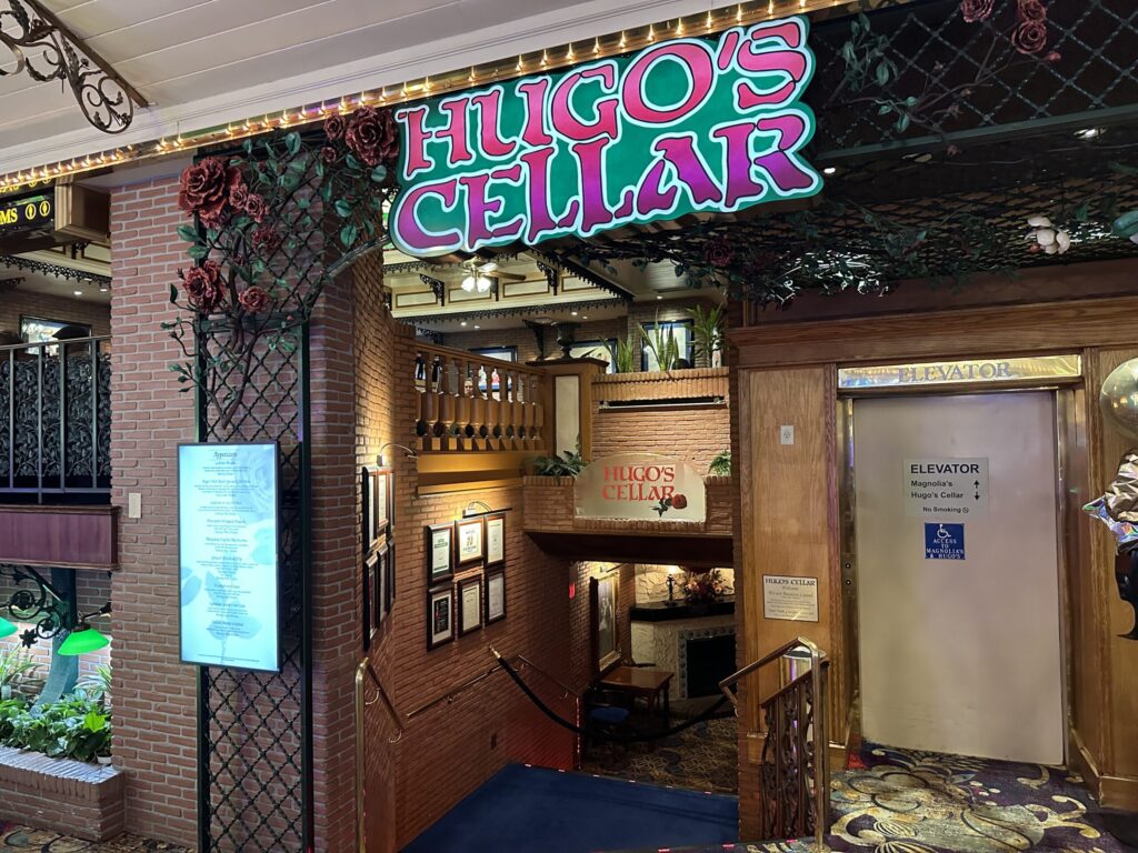 Exterior of Hugo's Cellar, which shows a staircase leading down to the restaurant.