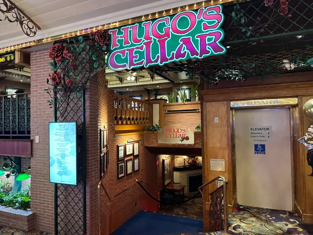 Exterior of Hugo's Cellar, which shows a staircase leading down to the restaurant.