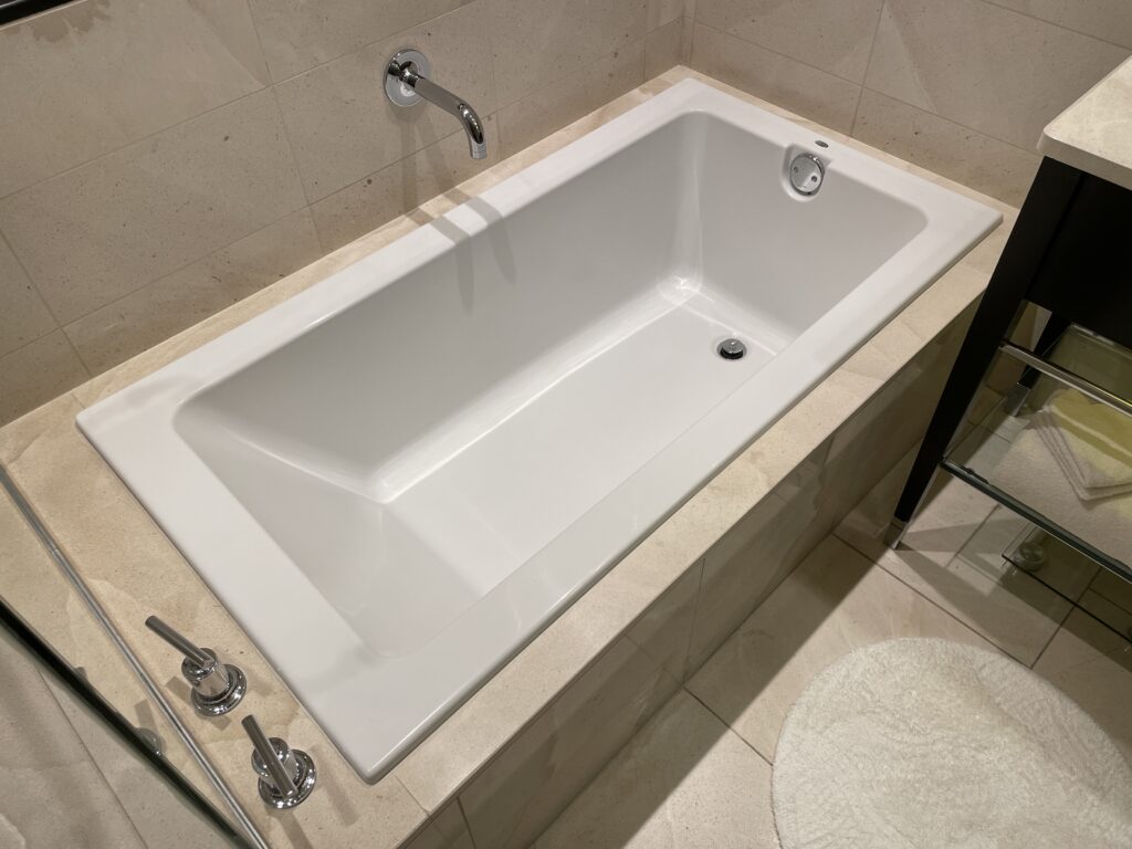 Close up photo of the white bathtub