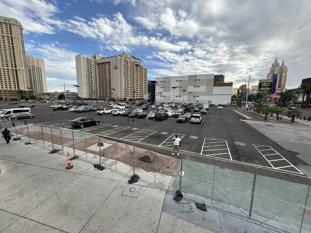 An asphault parking lot, which is owned by Fertitta.
