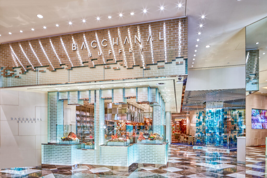 Exterior of the Bacchanal Buffet which is constructed of real, and glass bricks, giving it almost an icy appearance