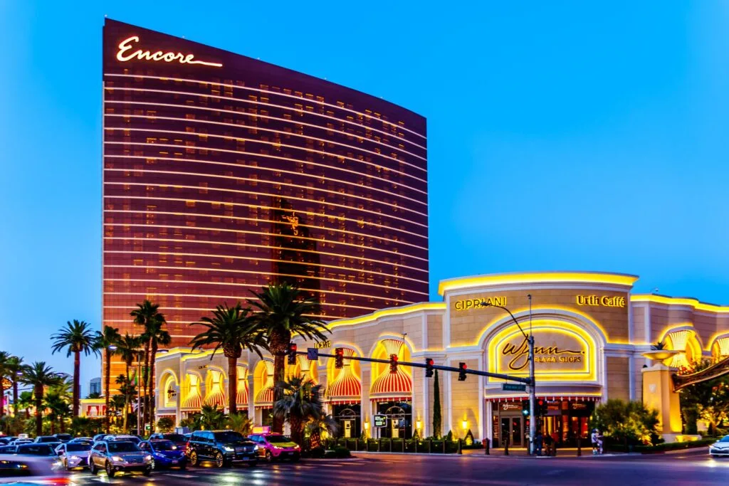 Encore Las Vegas' hotel tower exterior illuminated at dusk