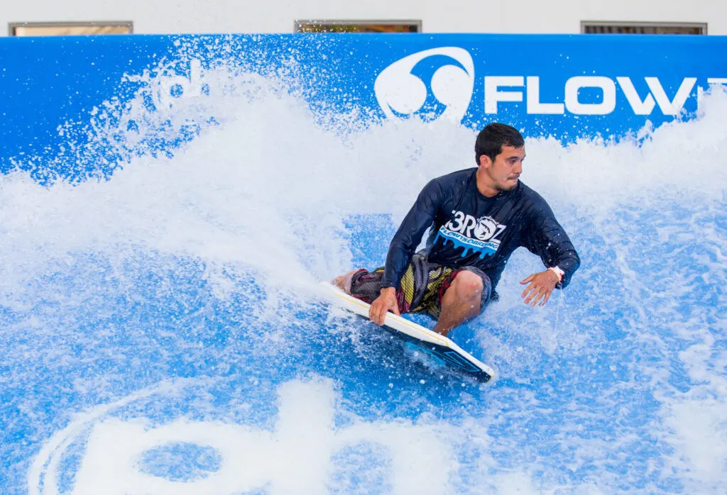 A surfer rides the flow rider at Planet Hollywood