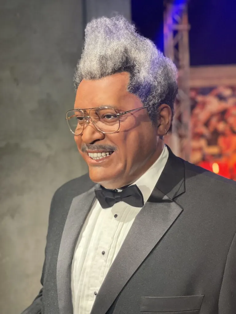 Don King wearing a black tux.