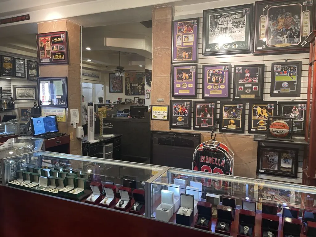 Sports Memrobilia on the wall at Pawn Stars