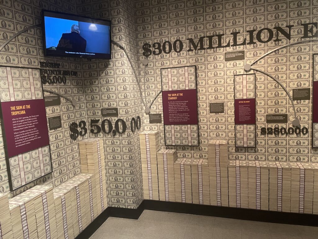 A room with cash lining the walls, almost as if it was wallpaper