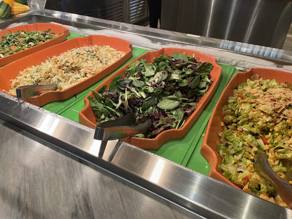 4 different salad options in bowls