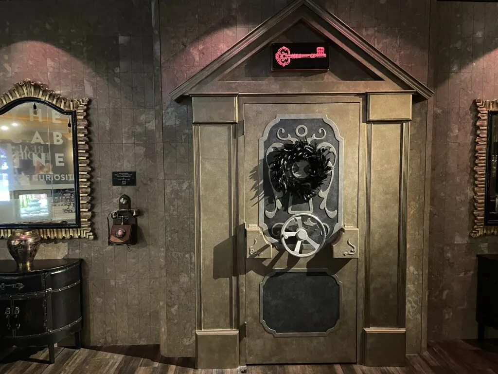 The Lock Speakeasy door, which resembles a vault door.