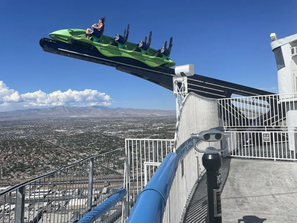 XScream tilting riders out over the edge of the tower.