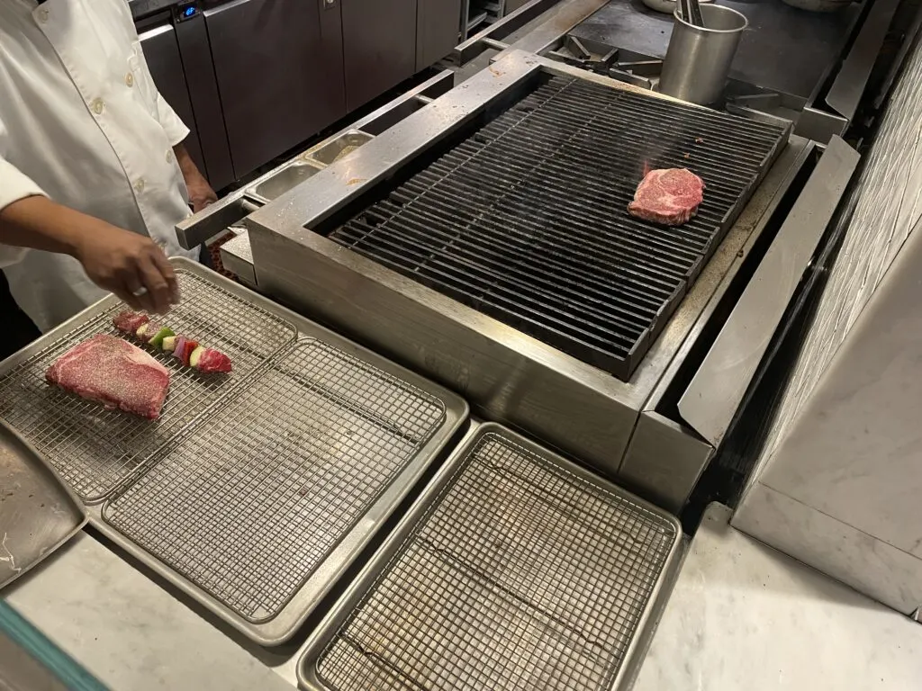 My steak on a grill.