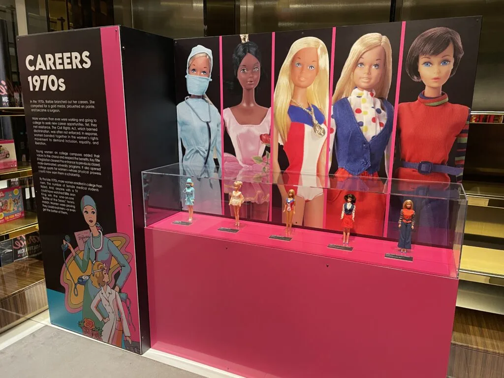 Display case depicting Barbie Careers in the 1970s. 