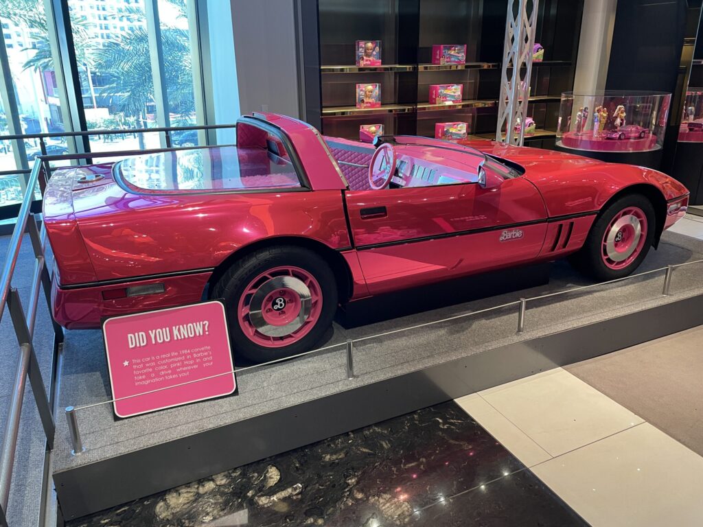 A pink Barbie inspired Corvette that you can sit behind the wheel of for a picture.