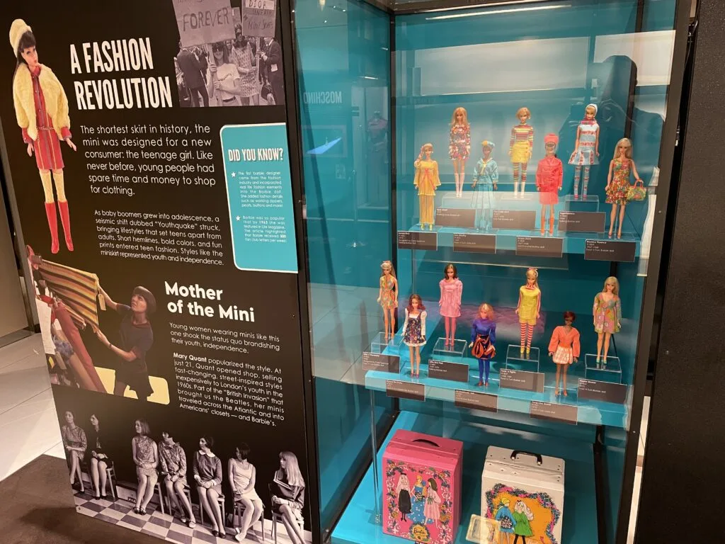 Display case of Barbie's "Fashion Revolution" line of clothing. 