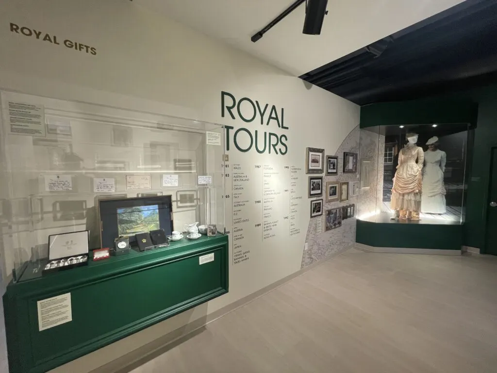 A room in the exhibit with artifacts and information about Diana's Royal Tours. 