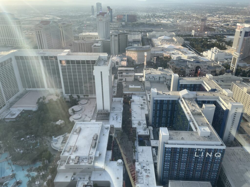 A view of the LINQ Promenade from the apex of the High Roller. On either side of the image are Flamingo and LINQ.