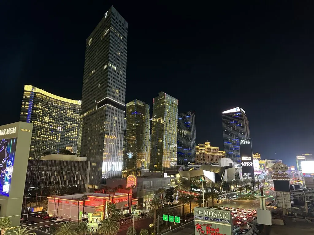 Center STrip Resorts from Brewdog's outdoor patio illuminated at night. 