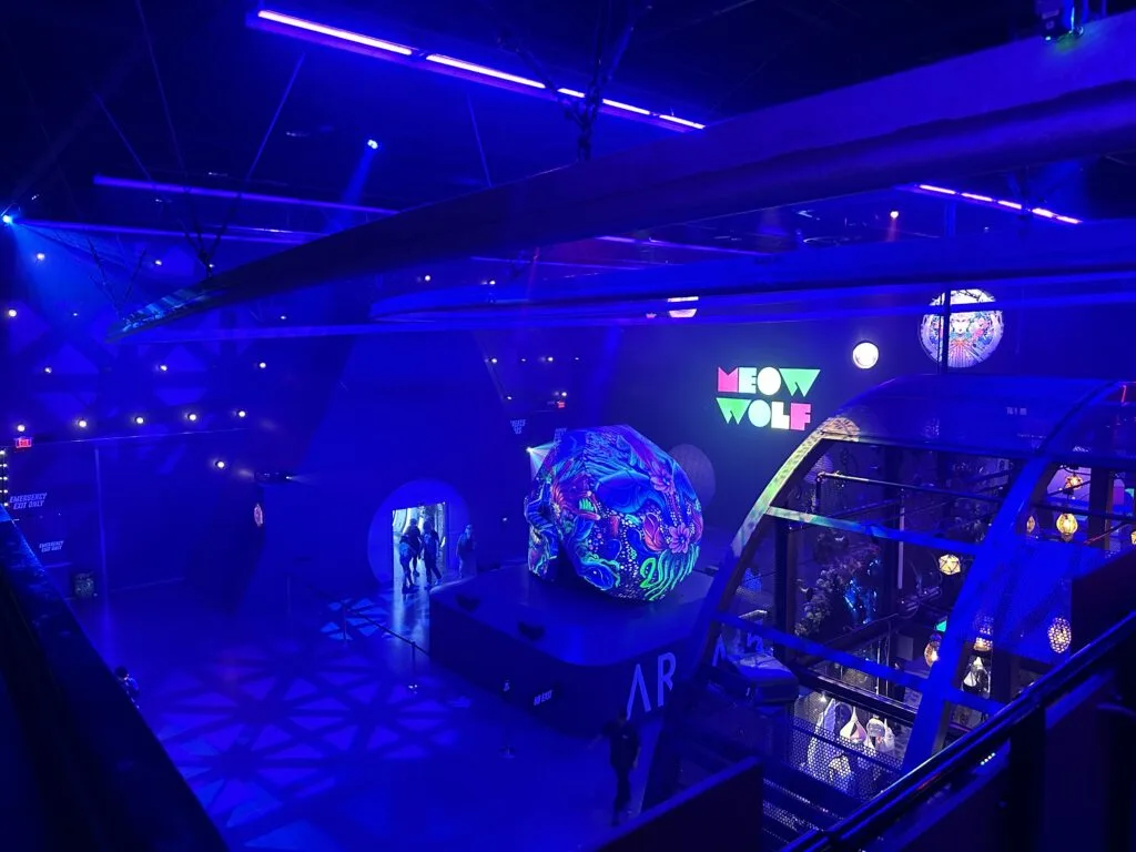 A view of the track Haley's Comet rides on, which loops around the ceiling at Area15.