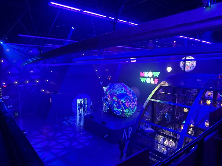 A view of the track Haley's Comet rides on, which loops around the ceiling at Area15.