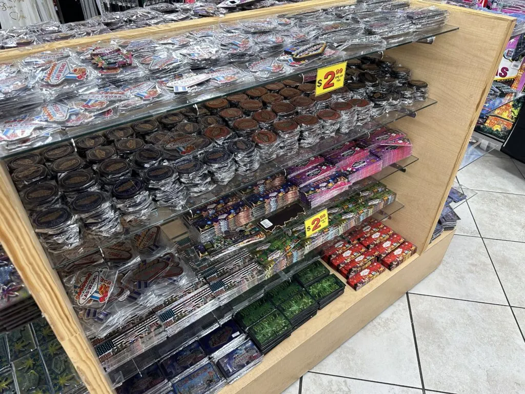 Candies, many of which emblazoned with images of the "Welcome to Las Vegas Sign" on a display rack. 