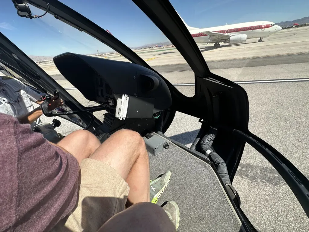 The View from my front seat in the helicopter. Windows start below my feet along the floor and go up to ceiling, ensuring great visibilty. 