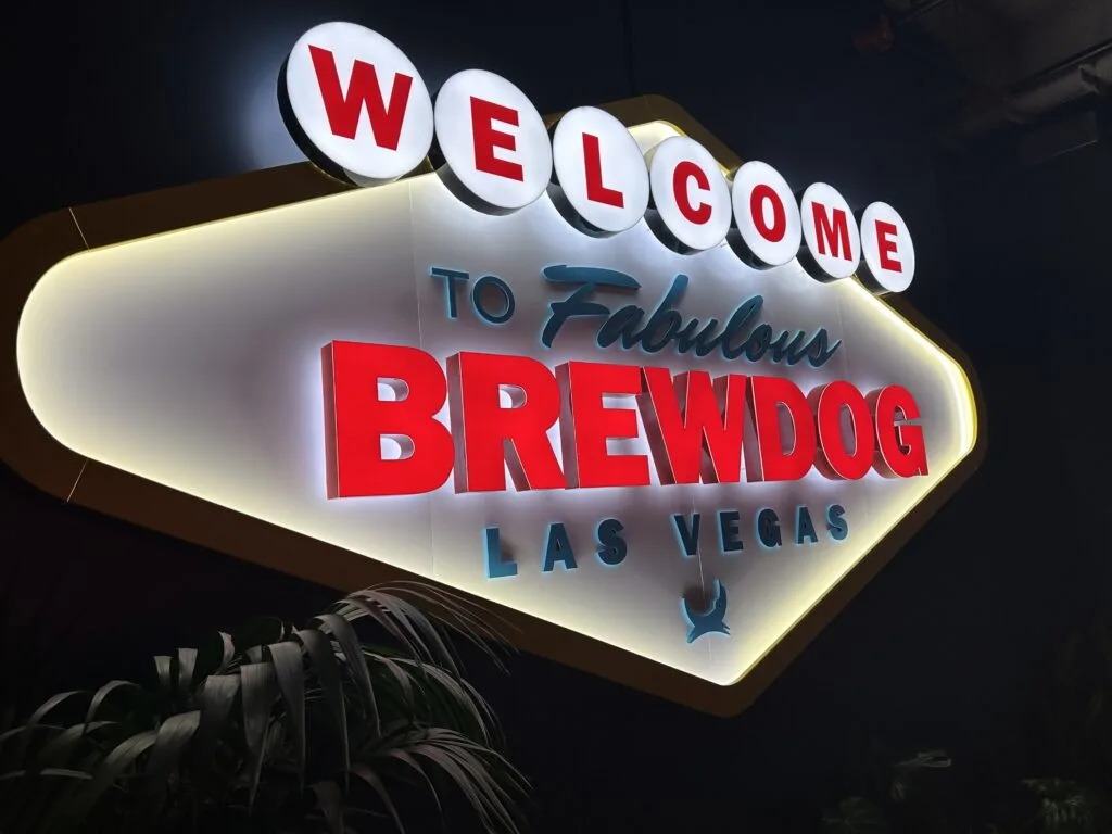 An illuminated sign that says "Welcome to fabulous Brewdog Las Vegas" in the sign of the Welcome to Las Vegas Sign.