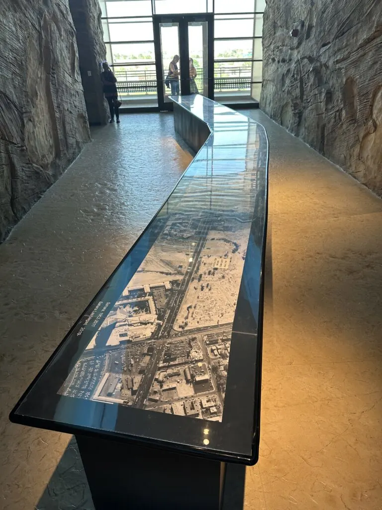 A long skinny aerial photograph of the Strip extends about 20 feet into the distance. 