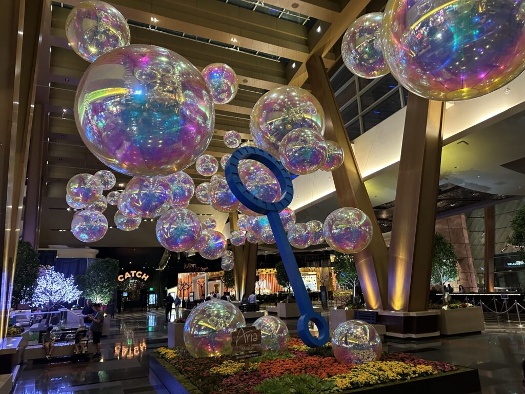 An artistic display on Aria's casino floor depicting bubbles floating through the air.
