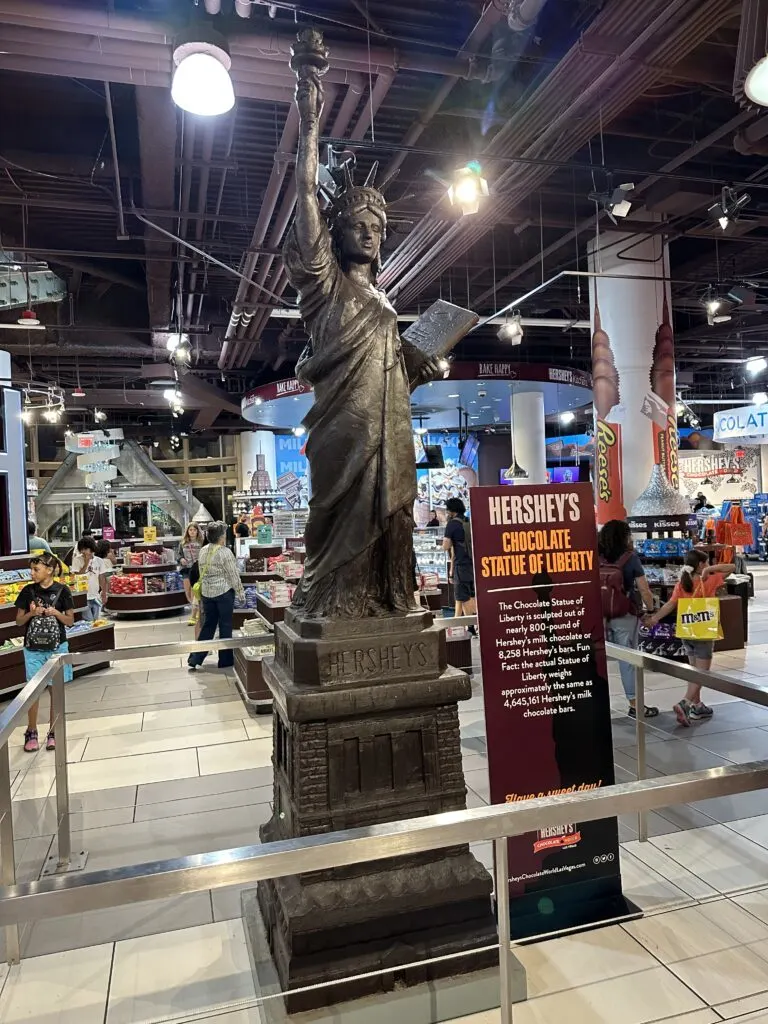 A 100% chocolate Statue of LIberty positioned in the entryway to Hershey's World.