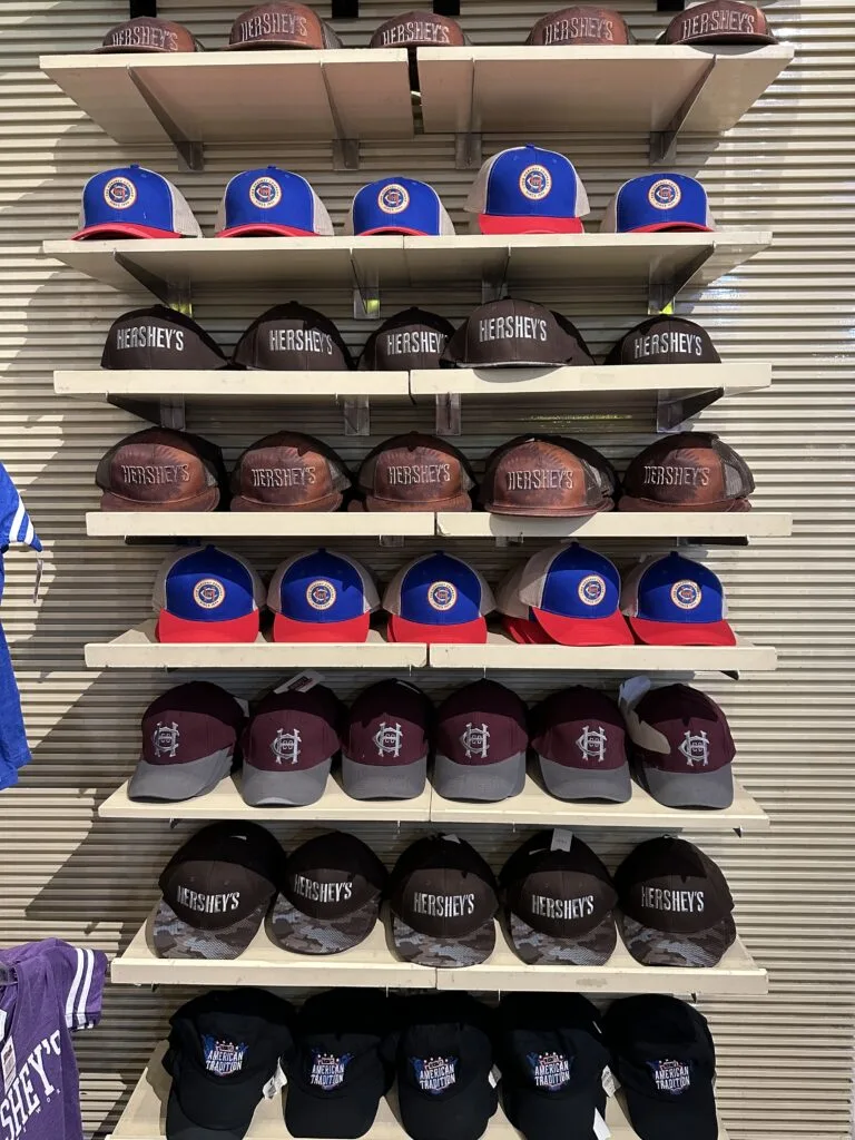 Hershey's Branded baseball hats on shelves. 