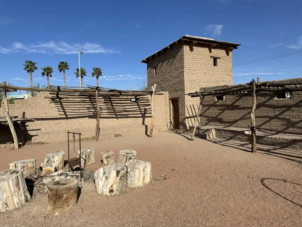 A guard tower rises above the walls in the corner of the fort.